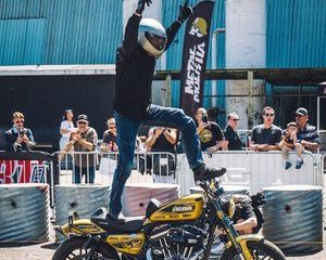 A Person Doing A Trick On A Motorcycle